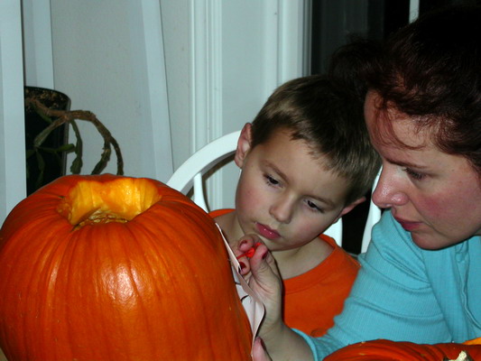Misty and Ryan Carving Pumpkins by Josh Poulson